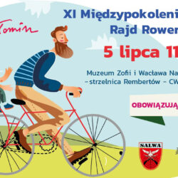 mężczyzna jadący jna rowerze z dzieckiem w foteliku