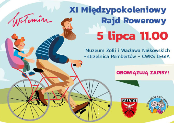 mężczyzna jadący jna rowerze z dzieckiem w foteliku
